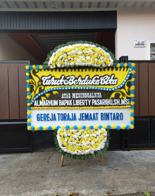 Papan Bunga Duka di Cihideung